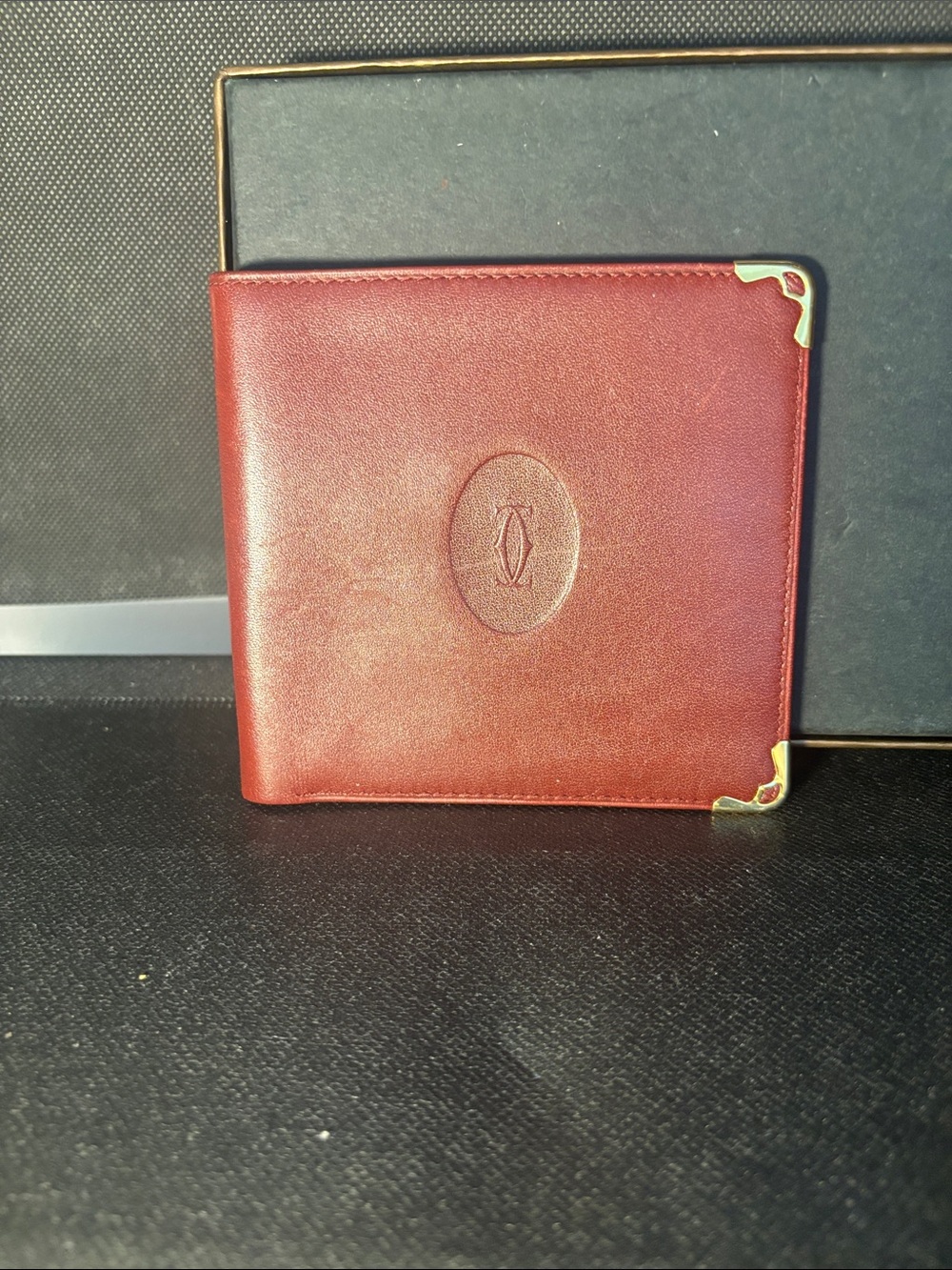 Cartier Burgundy Leather Bifold Card Holder with Gold Corner Accents